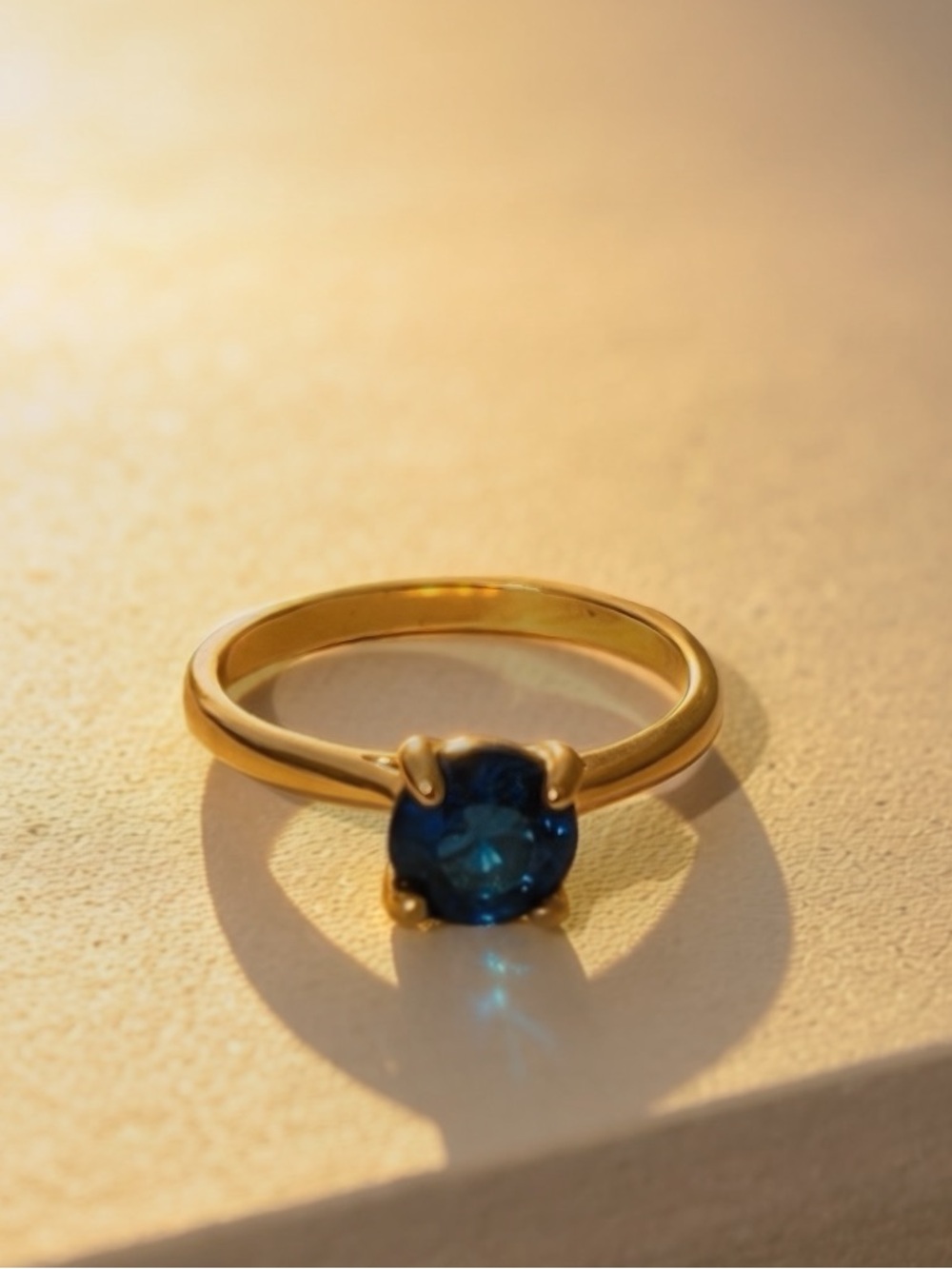 Gold Ring with Deep Blue Sapphire-Style Stone